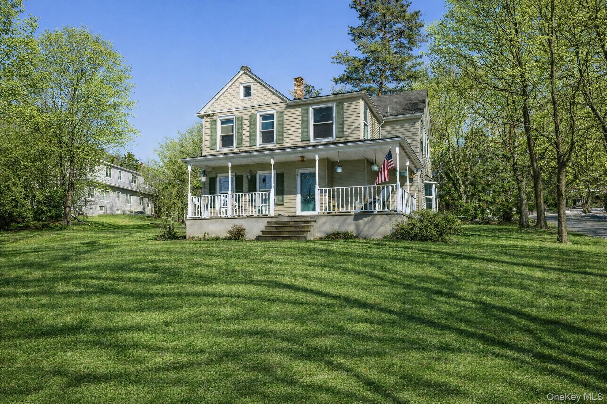 90 South Middletown Road Pearl River, NY 10965 - Photo 2 of 47 a front view of a house with a garden