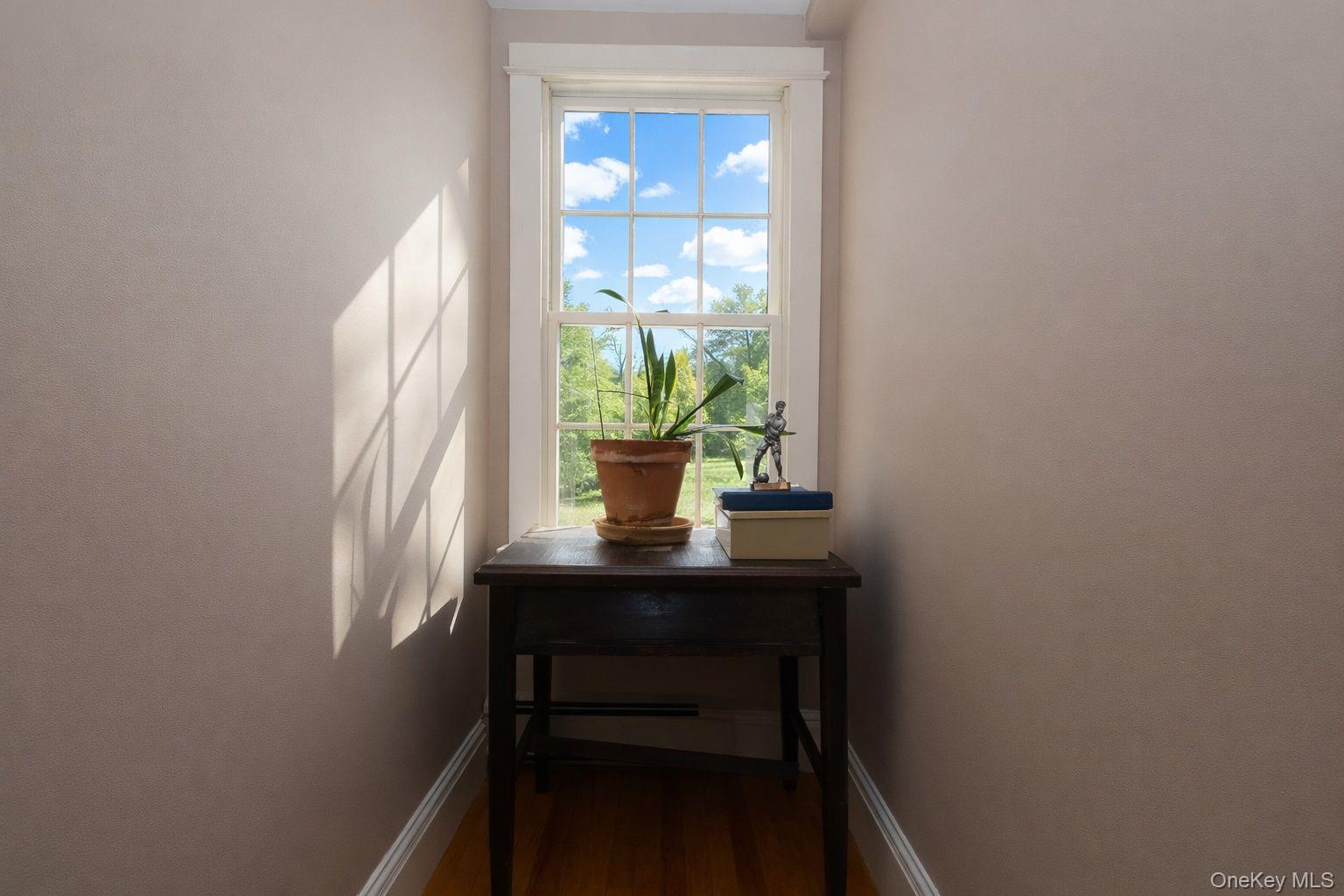 90 South Middletown Road Pearl River, NY 10965 - Photo 28 of 47 a view of a room that has a window and wooden floor