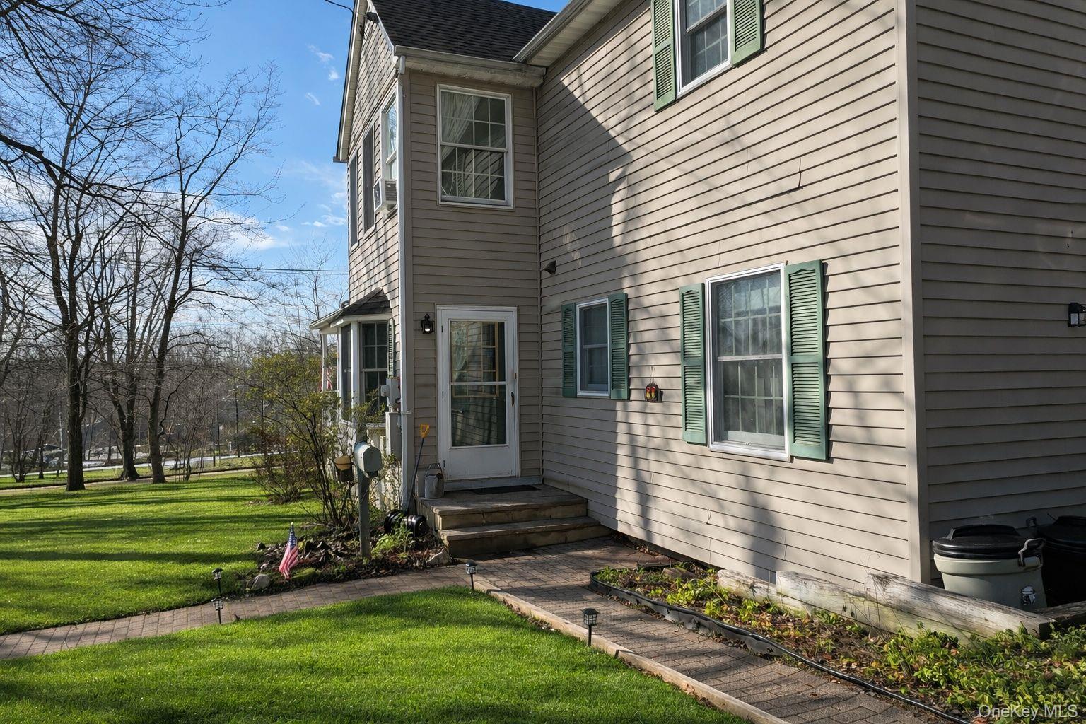 90 South Middletown Road Pearl River, NY 10965 - Photo 3 of 47 a front view of a house with a yard