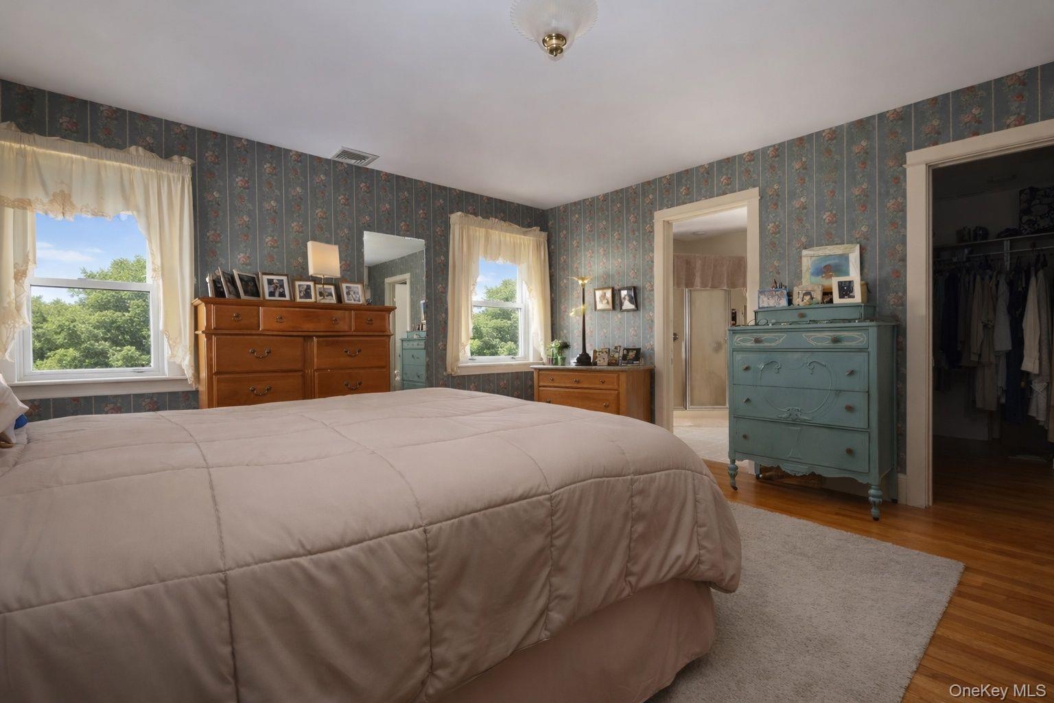 90 South Middletown Road Pearl River, NY 10965 - Photo 36 of 47 a bedroom with a large bed and a dresser