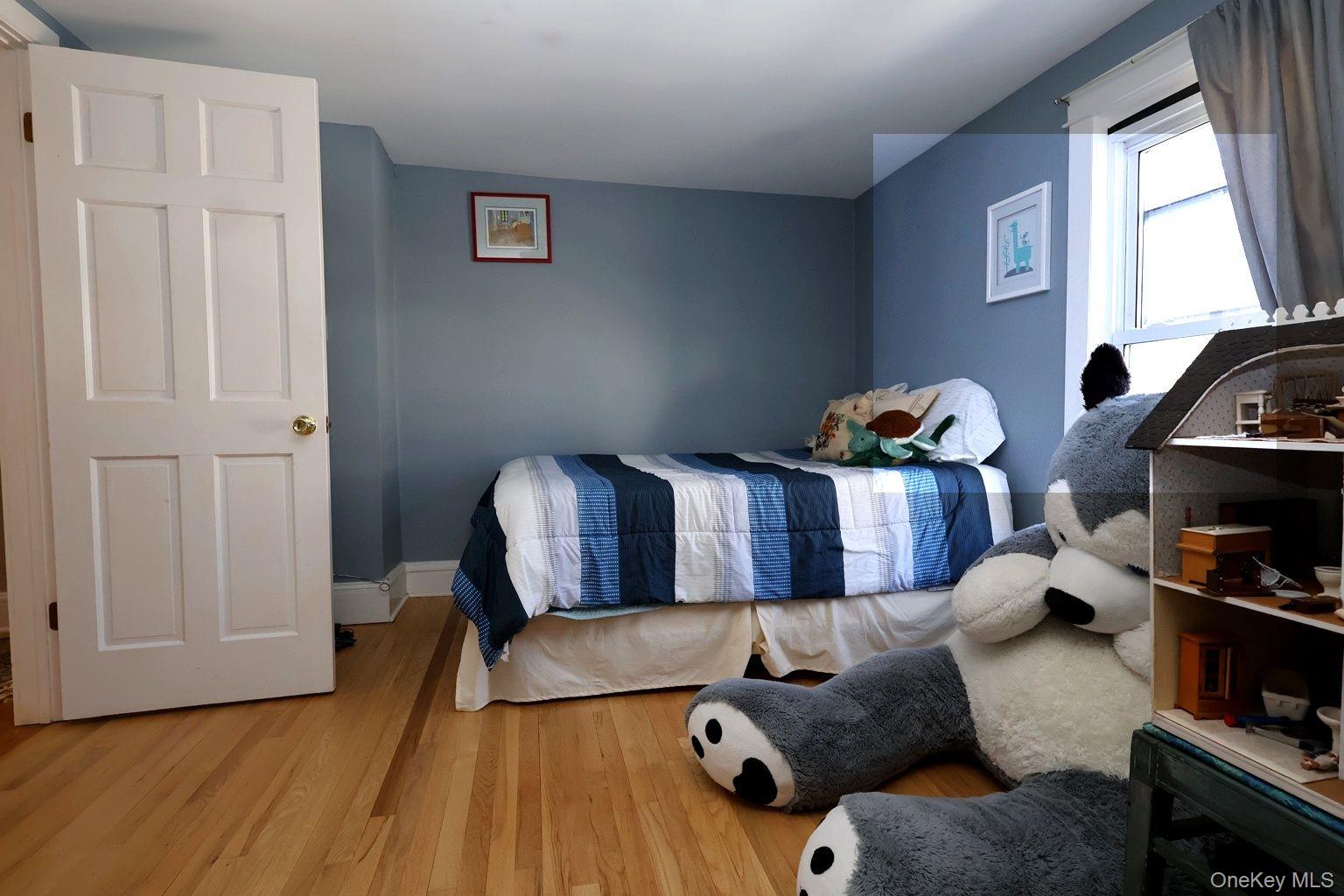 90 South Middletown Road Pearl River, NY 10965 - Photo 38 of 47 a living room with furniture and a wooden floor