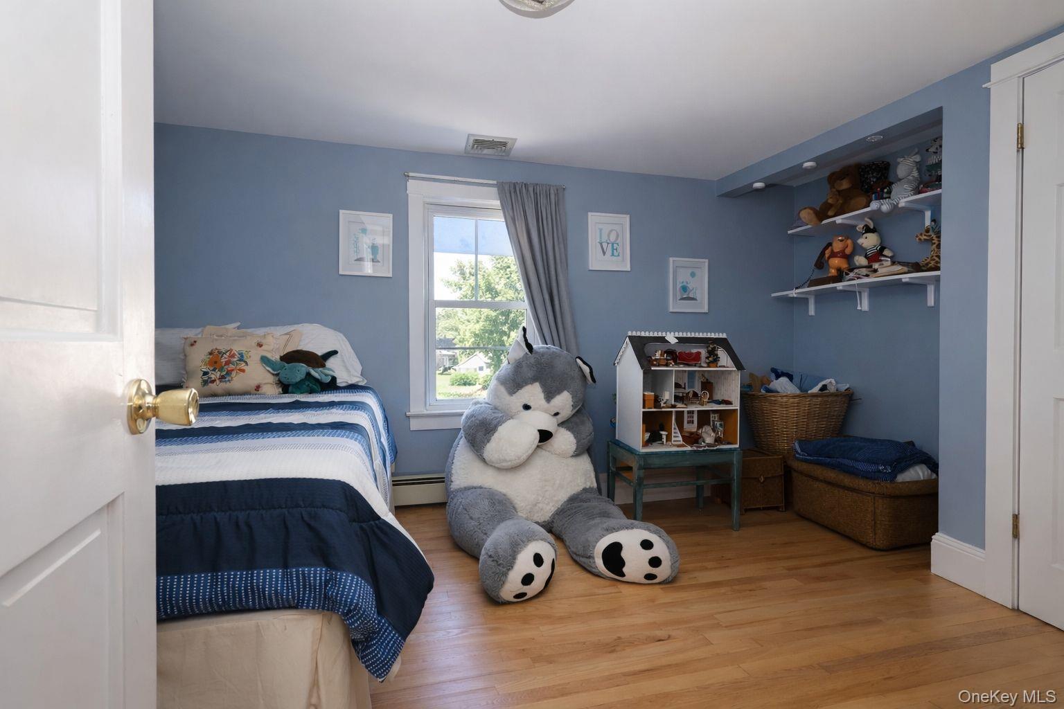 90 South Middletown Road Pearl River, NY 10965 - Photo 39 of 47 a bedroom with furniture and a window