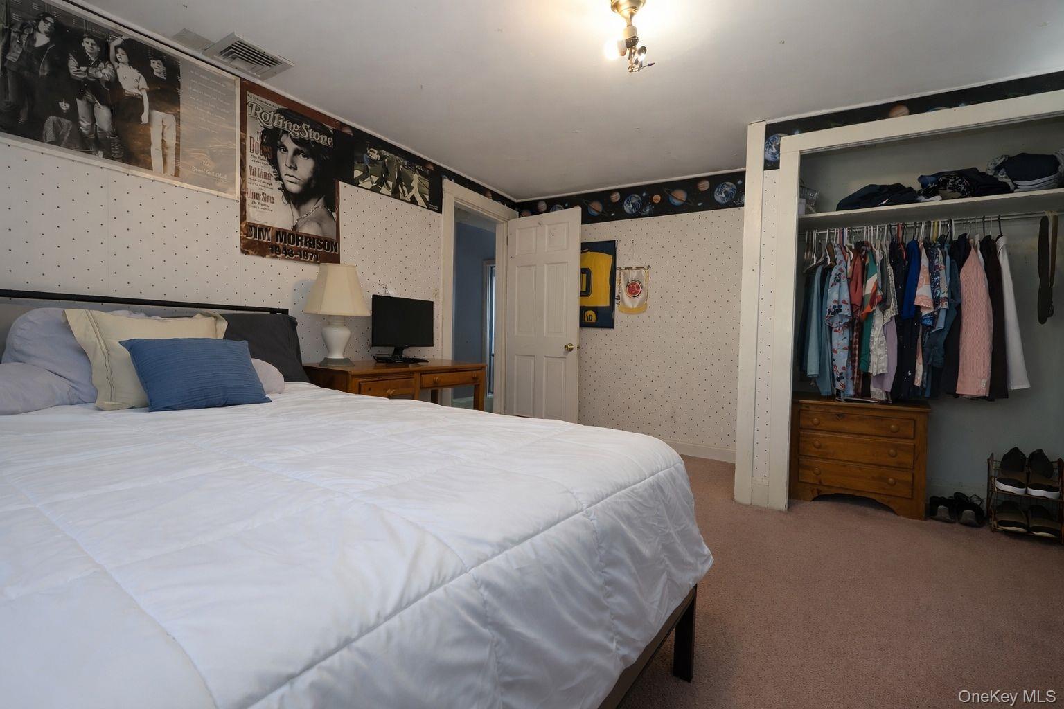 90 South Middletown Road Pearl River, NY 10965 - Photo 42 of 47 a bedroom with a large bed and a window