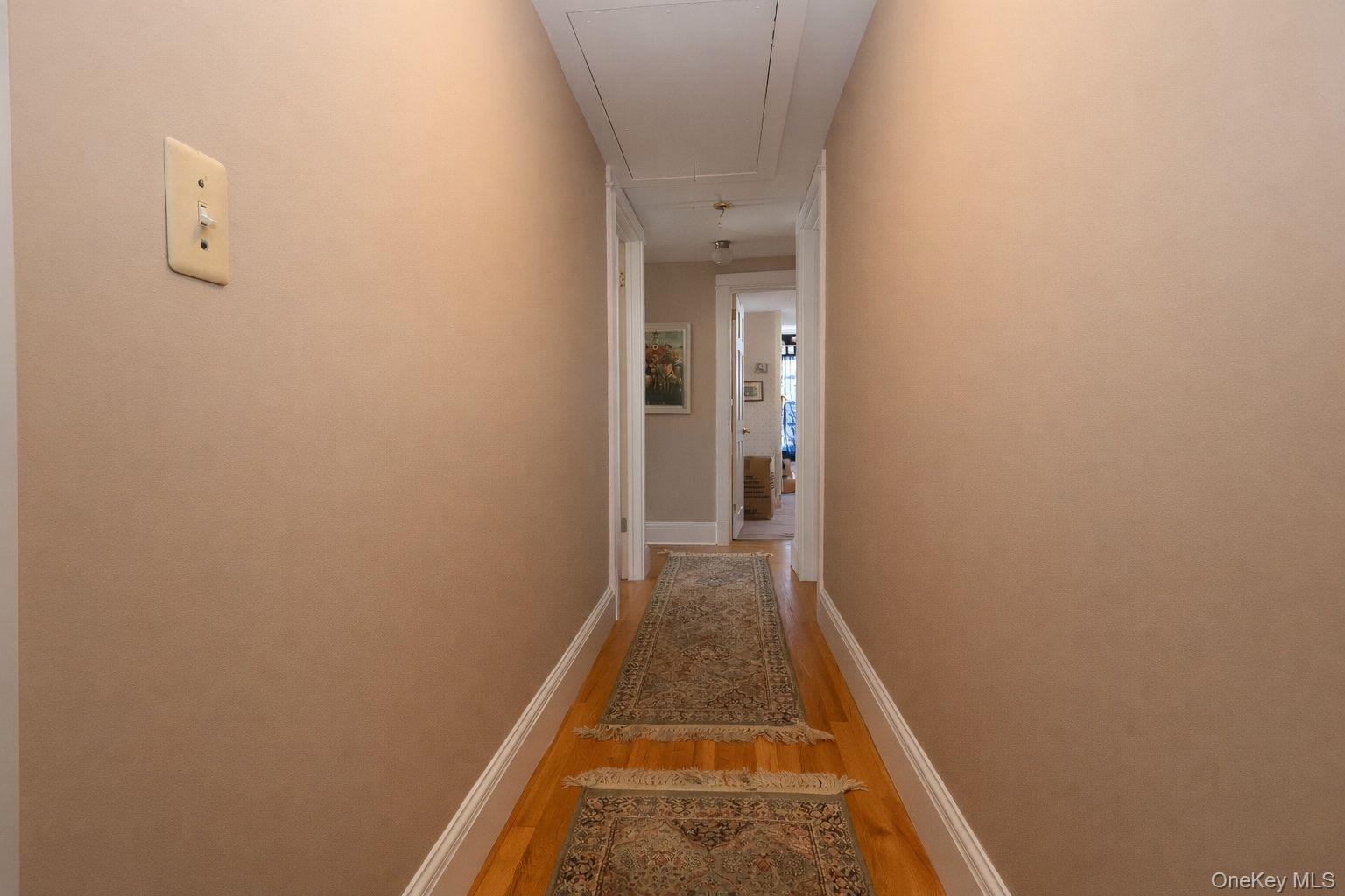 90 South Middletown Road Pearl River, NY 10965 - Photo 43 of 47 a view of a hallway with a door and wooden floor