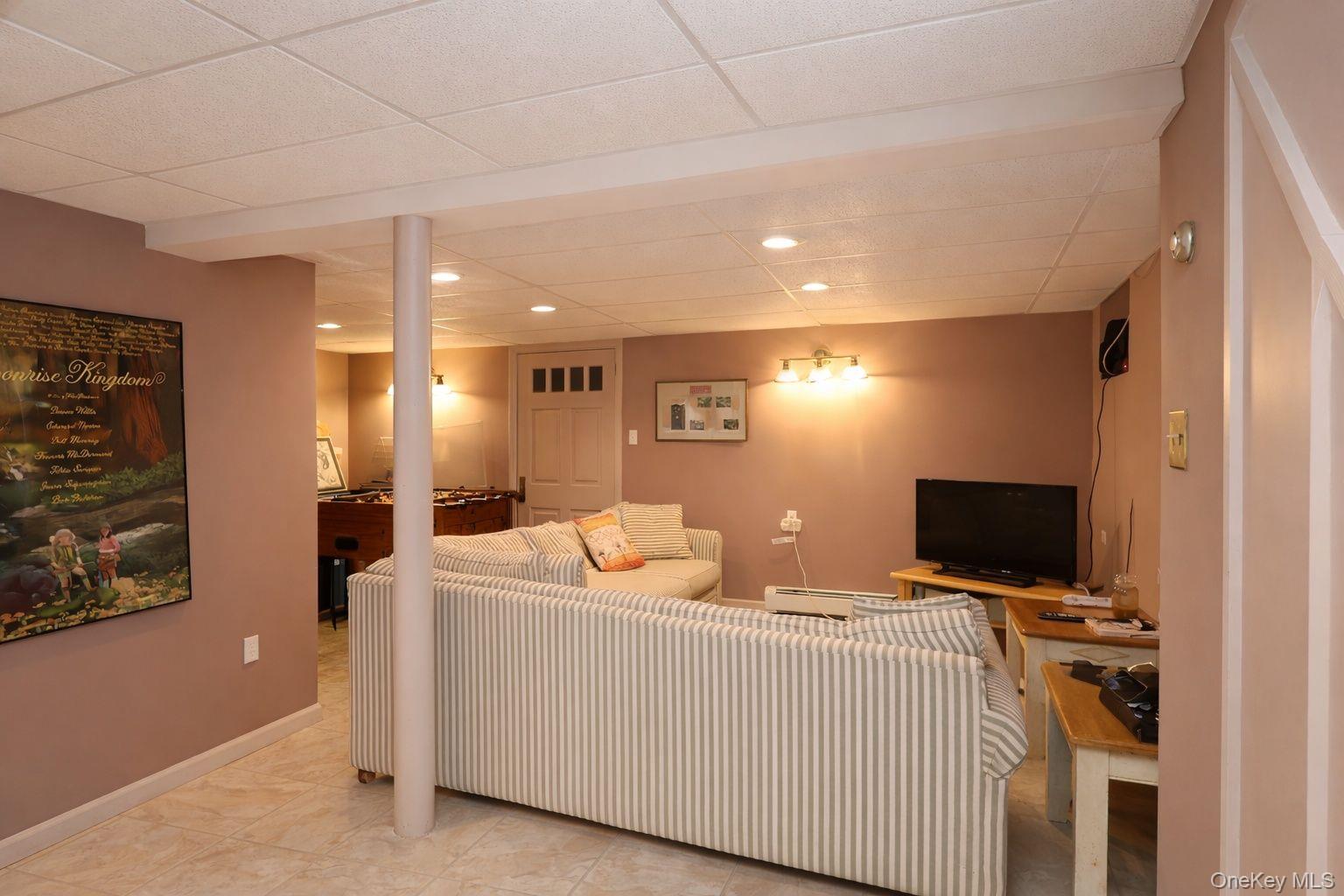 90 South Middletown Road Pearl River, NY 10965 - Photo 46 of 47 a room with furniture and a flat screen tv