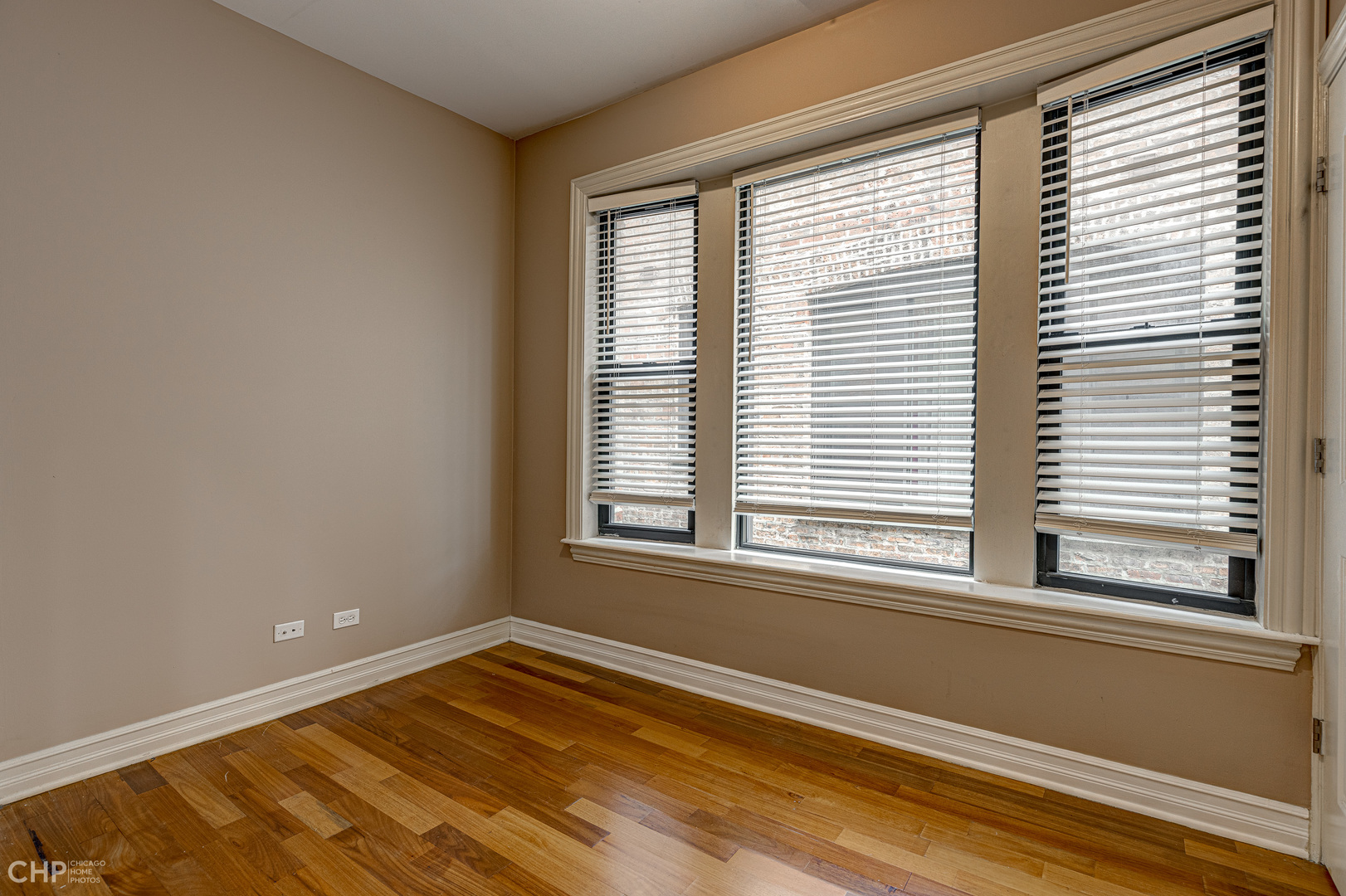 1363 East 64th Street, Unit 2 Chicago, IL 60637 - Photo 7 of 12 a view of a room with a large window