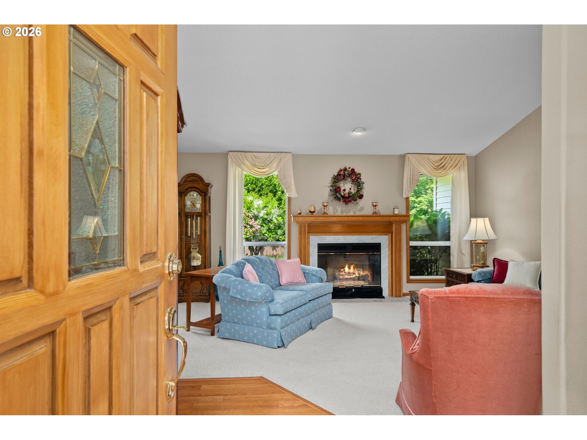 3081 Southwest 31st Street Gresham, OR 97080 - Photo 5 of 38 a living room with furniture and a fireplace