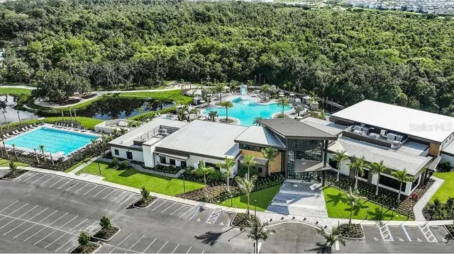 a view of a balcony with yard