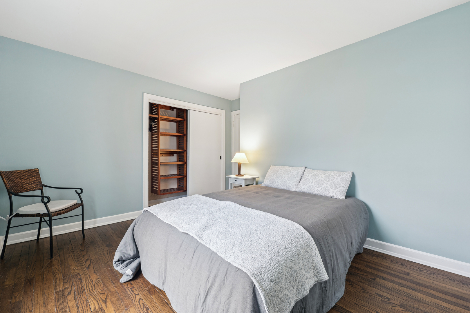 170 East Old Elm Road Lake Forest, IL 60045 - Photo 13 of 31 a bedroom with a bed and a chair