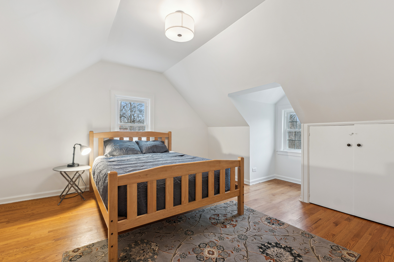 170 East Old Elm Road Lake Forest, IL 60045 - Photo 15 of 31 a bedroom with furniture and wooden floor