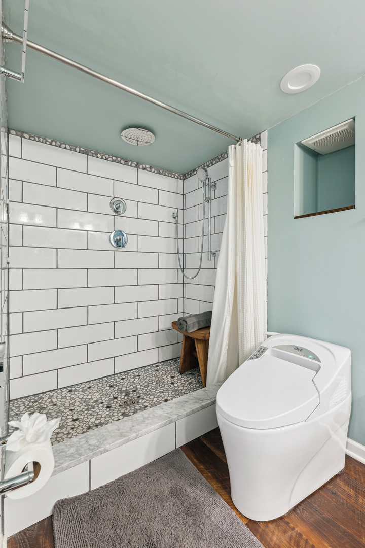 170 East Old Elm Road Lake Forest, IL 60045 - Photo 22 of 31 a bathroom with a toilet and shower