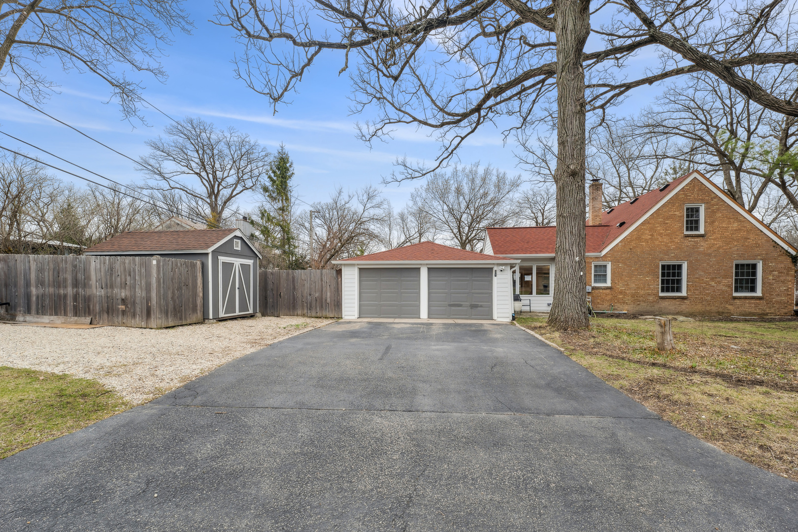 170 East Old Elm Road Lake Forest, IL 60045 - Photo 27 of 31 a front view of a house with a yard and garage