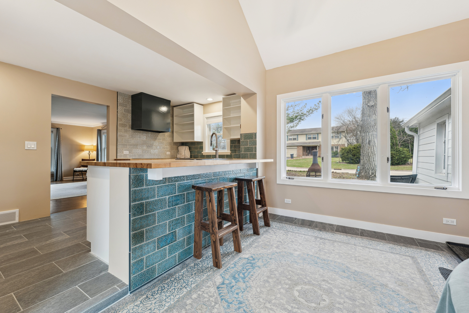 170 East Old Elm Road Lake Forest, IL 60045 - Photo 7 of 31 a view of kitchen with kitchen island a window and a sink