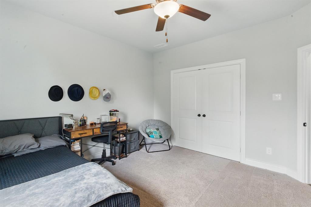 3385 Dps Tower Road Perrin, TX 76486 - Photo 34 of 35 a living room with furniture and a wooden floor