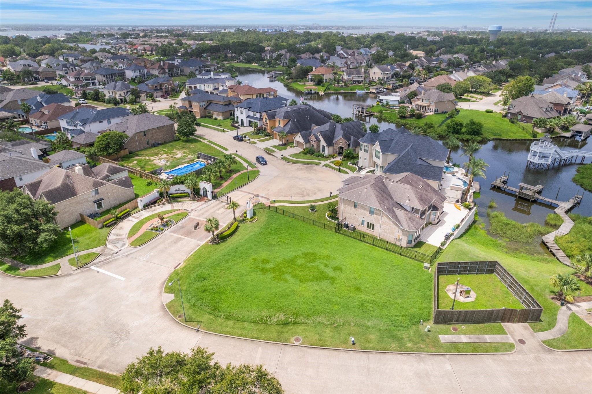 0 Water Way Seabrook, TX 77586 - Photo 2 of 16 an aerial view of residential houses with outdoor space