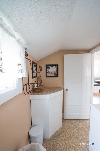 127 Shore Road Clinton, CT 06413 - Photo 5 of 20 a view of bathroom with sink mirror and toilet