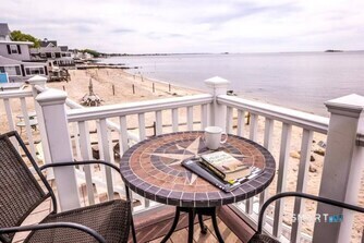 127 Shore Road Clinton, CT 06413 - Photo 9 of 20 a view of a balcony with furniture