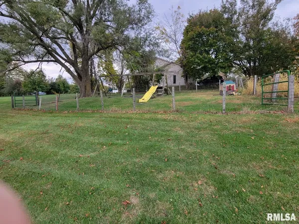 a view of a park with tree s