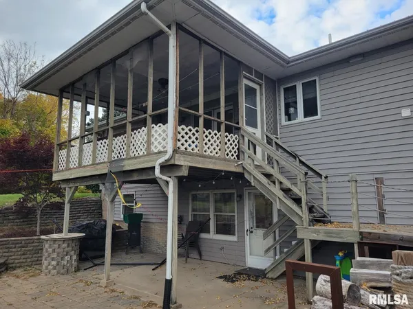 a front view of a house with glass windows