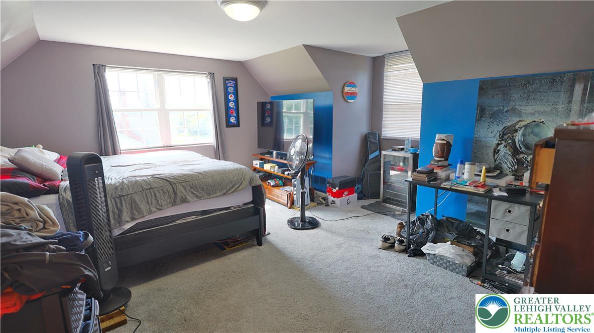 1345 Macada Road Bethlehem, PA 18017 - Photo 16 of 23 a bed room with a bed and a window