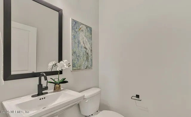 a front view of a building with parking space