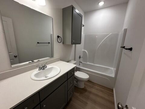 5511 Itasca Street Lubbock, TX 79416 - Photo 14 of 21 a bathroom with a sink toilet a mirror and shower