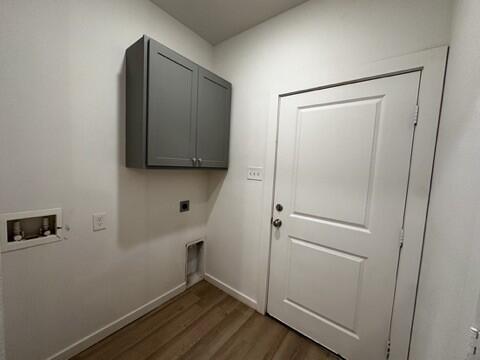 5511 Itasca Street Lubbock, TX 79416 - Photo 7 of 21 a room with a wooden floor and closet