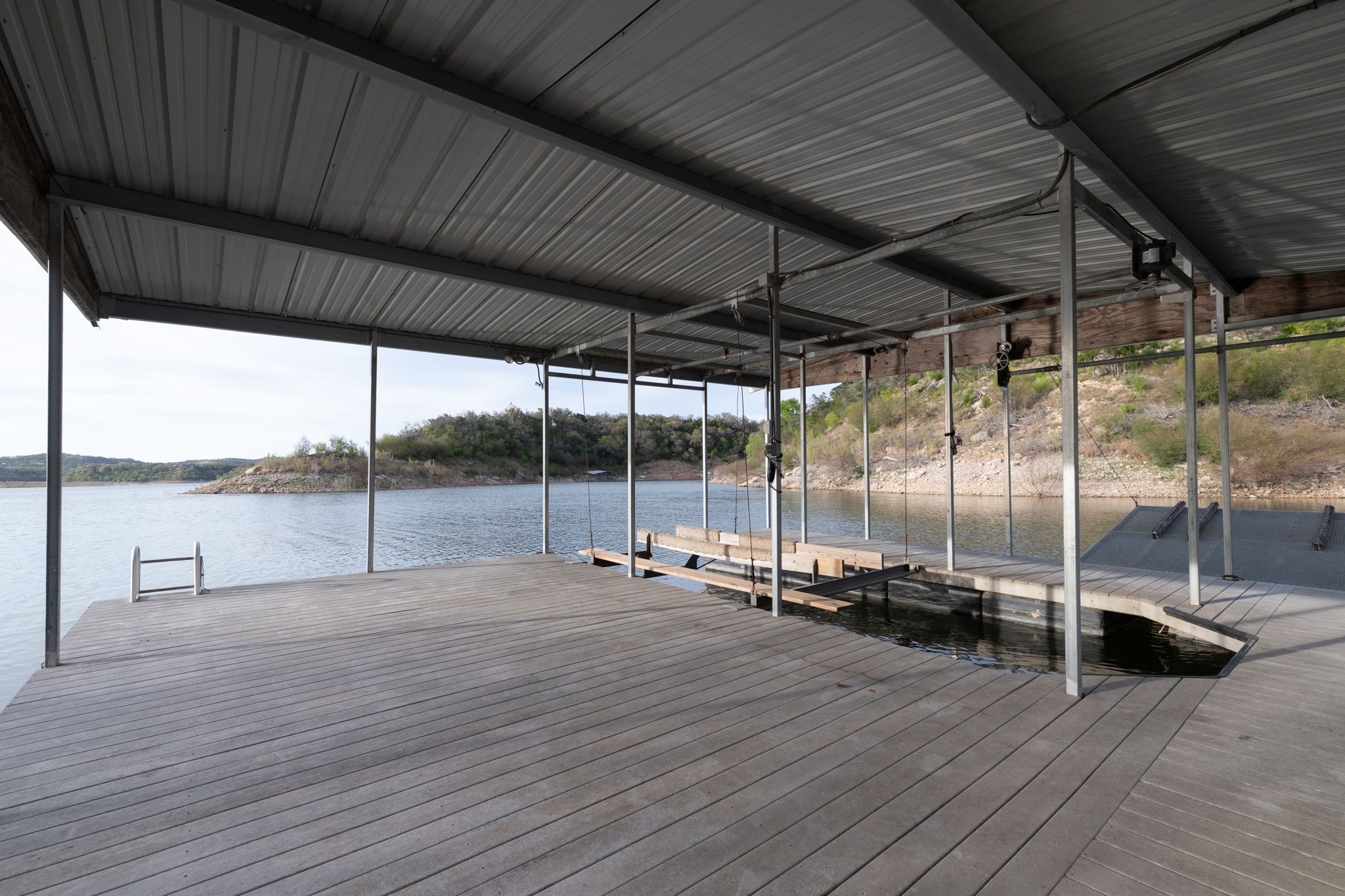 5010 Lookout Ridge Drive Marble Falls, TX 78654 - Photo 10 of 40 Dock with a water view and boat lift