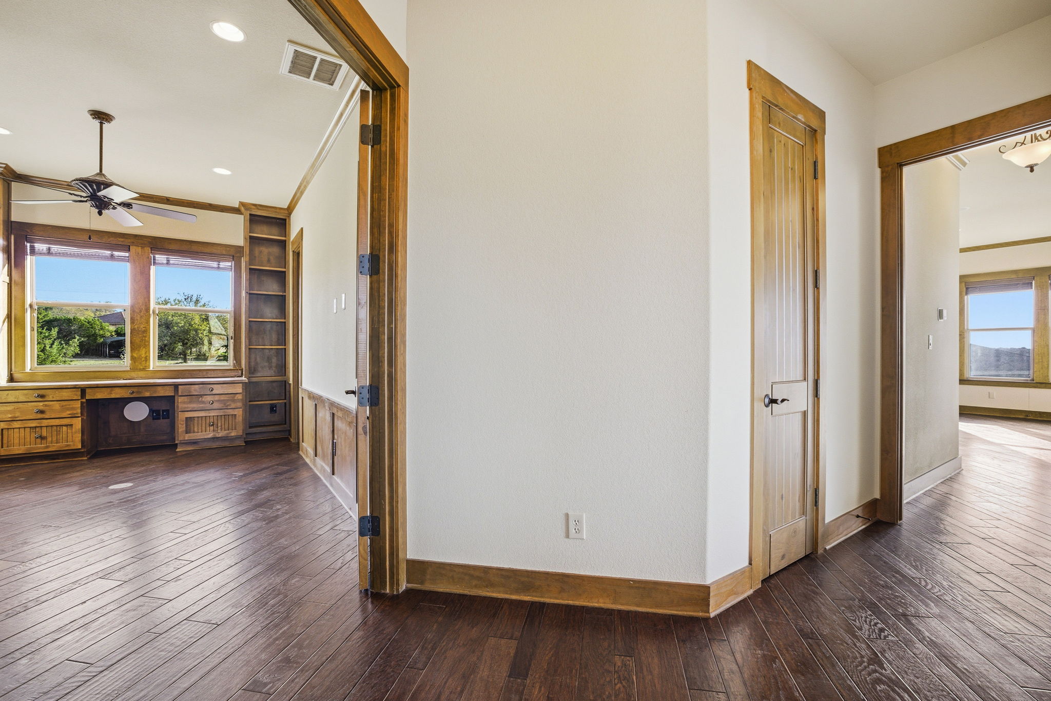 5010 Lookout Ridge Drive Marble Falls, TX 78654 - Photo 15 of 40 Hallway with dark wood-style flooring and baseboards
