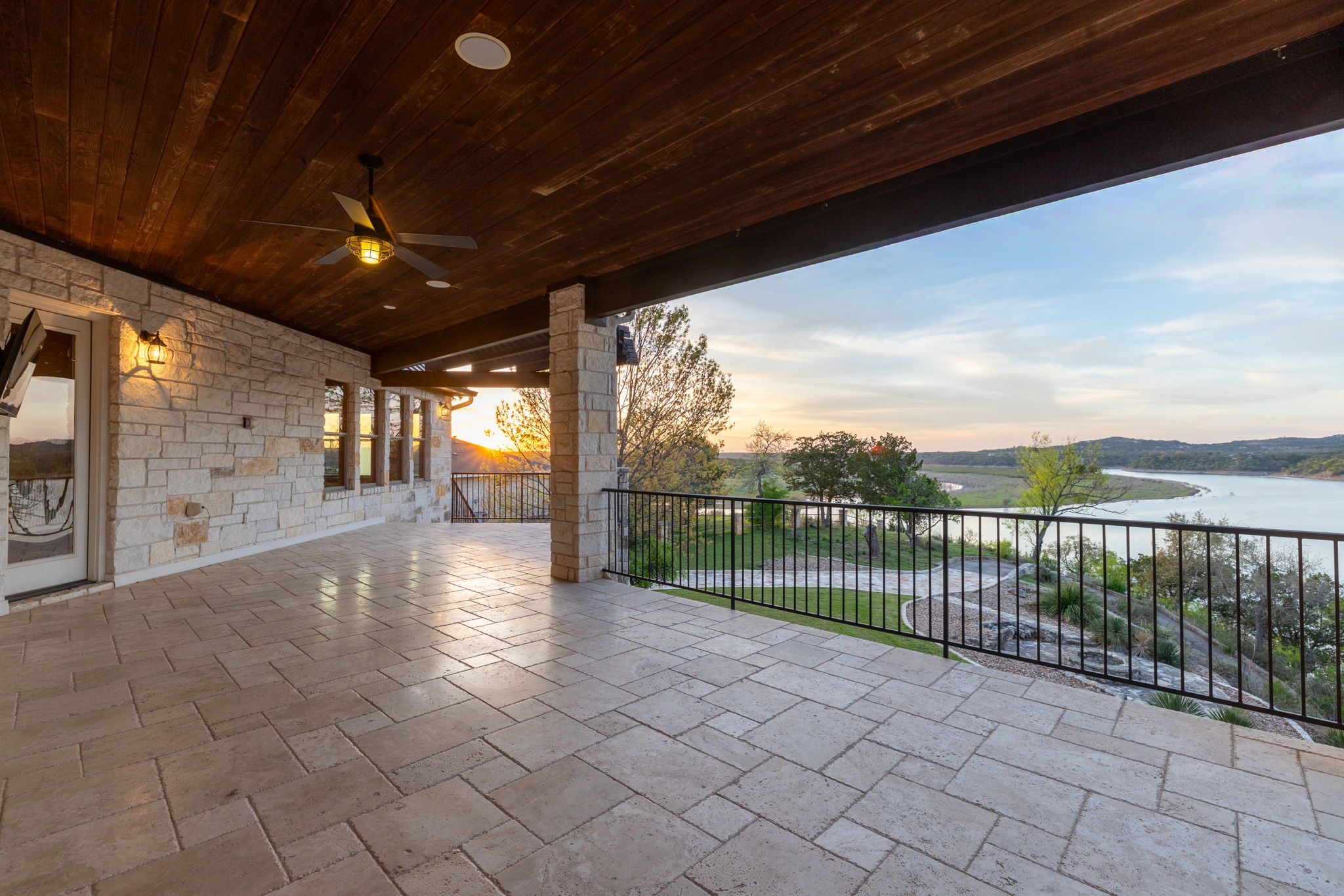 5010 Lookout Ridge Drive Marble Falls, TX 78654 - Photo 6 of 40 View of patio / terrace with ceiling fan and a water view