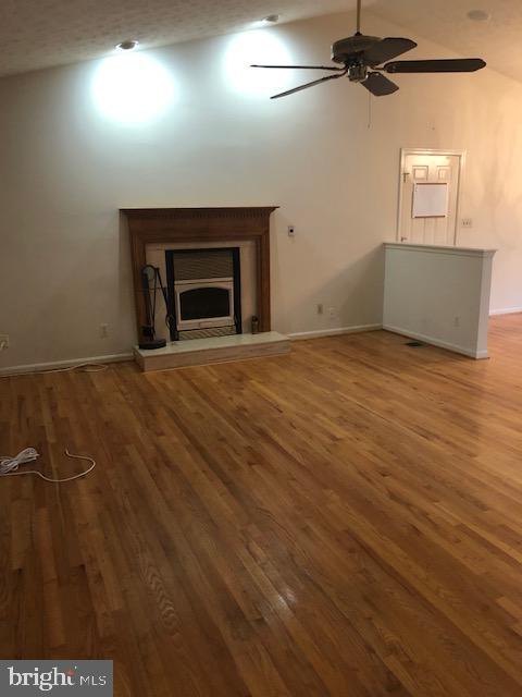 12946 Soundings Road Lusby, MD 20657 - Photo 10 of 55 Gas fireplace and spacious design