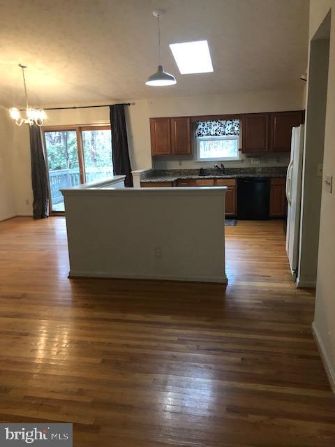 12946 Soundings Road Lusby, MD 20657 - Photo 12 of 55 Kitchen open to family room