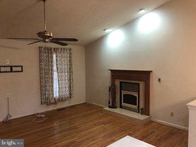 12946 Soundings Road Lusby, MD 20657 - Photo 15 of 55 Cozy fireplace
