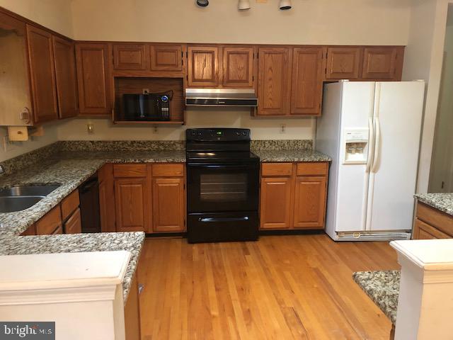 12946 Soundings Road Lusby, MD 20657 - Photo 5 of 55 Family room off kitchen