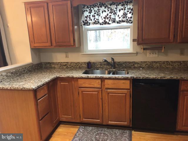 12946 Soundings Road Lusby, MD 20657 - Photo 8 of 55 Views of rear lawn from sink