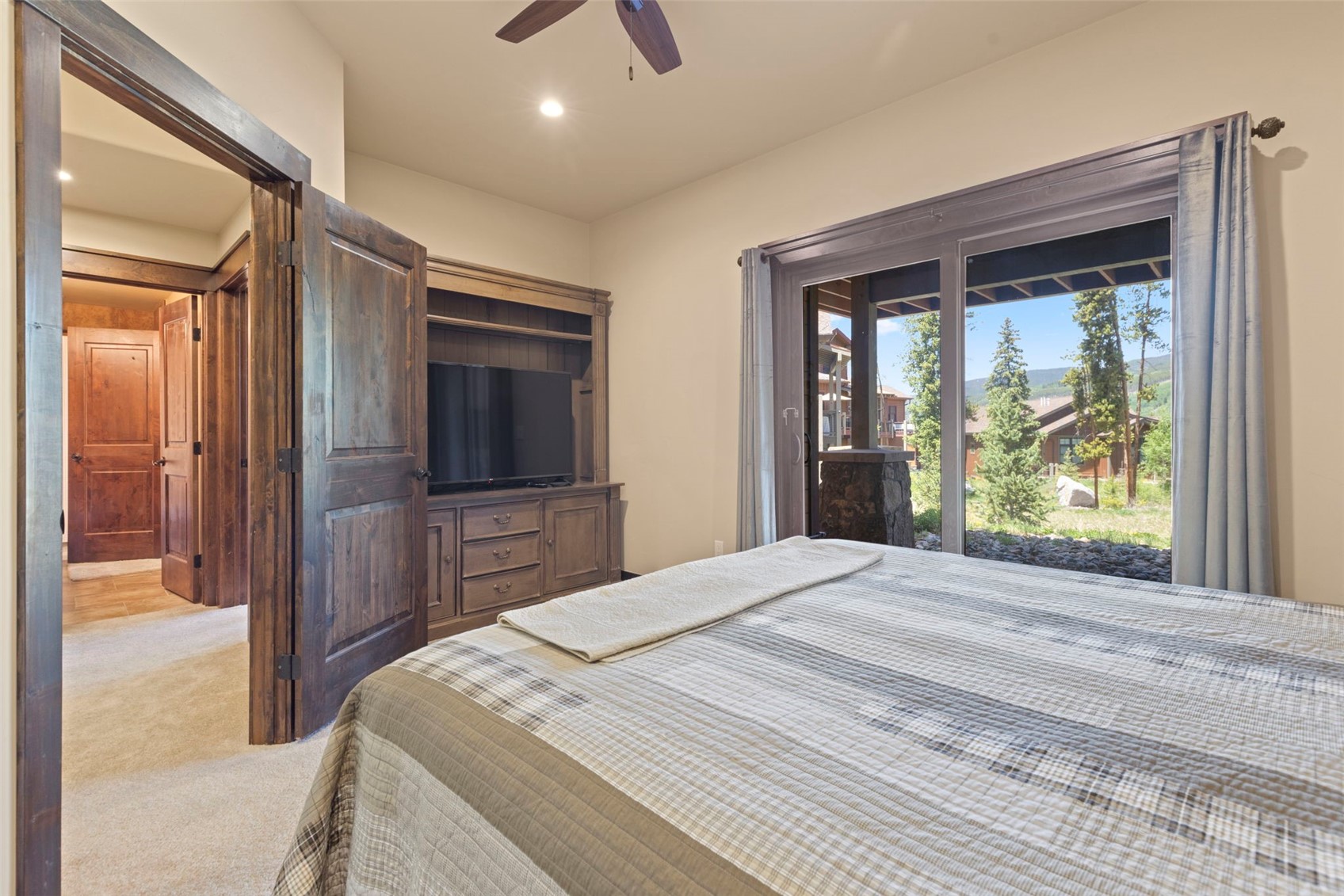 799 Independence Road, Unit 799 Keystone, CO 80435 - Photo 36 of 44 Carpeted bedroom featuring access to outside, a ceiling fan, and recessed lighting