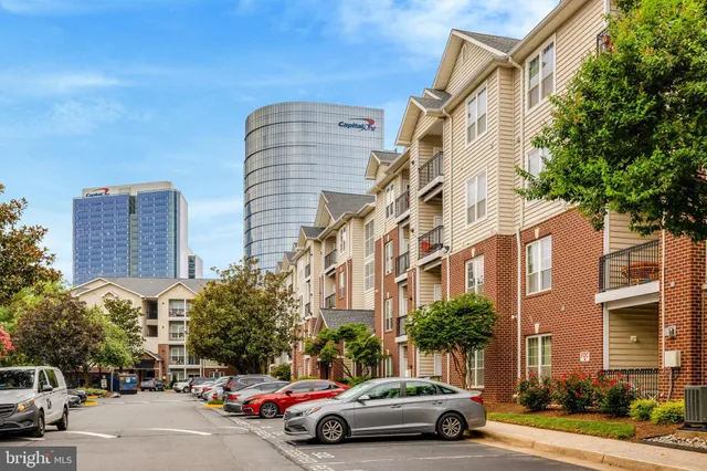 a view of a cars parked in front of a building