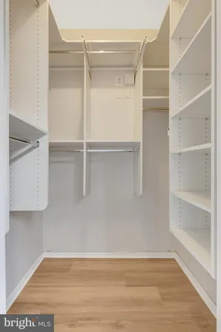 a view of an empty walk in closet