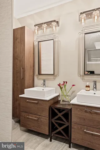 a view of livingroom with furniture wooden floor windows and staircase