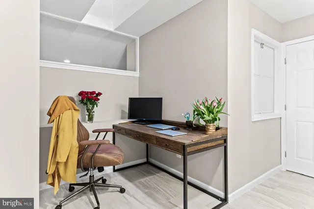 a kitchen with stainless steel appliances granite countertop a refrigerator a stove top oven a sink and dishwasher