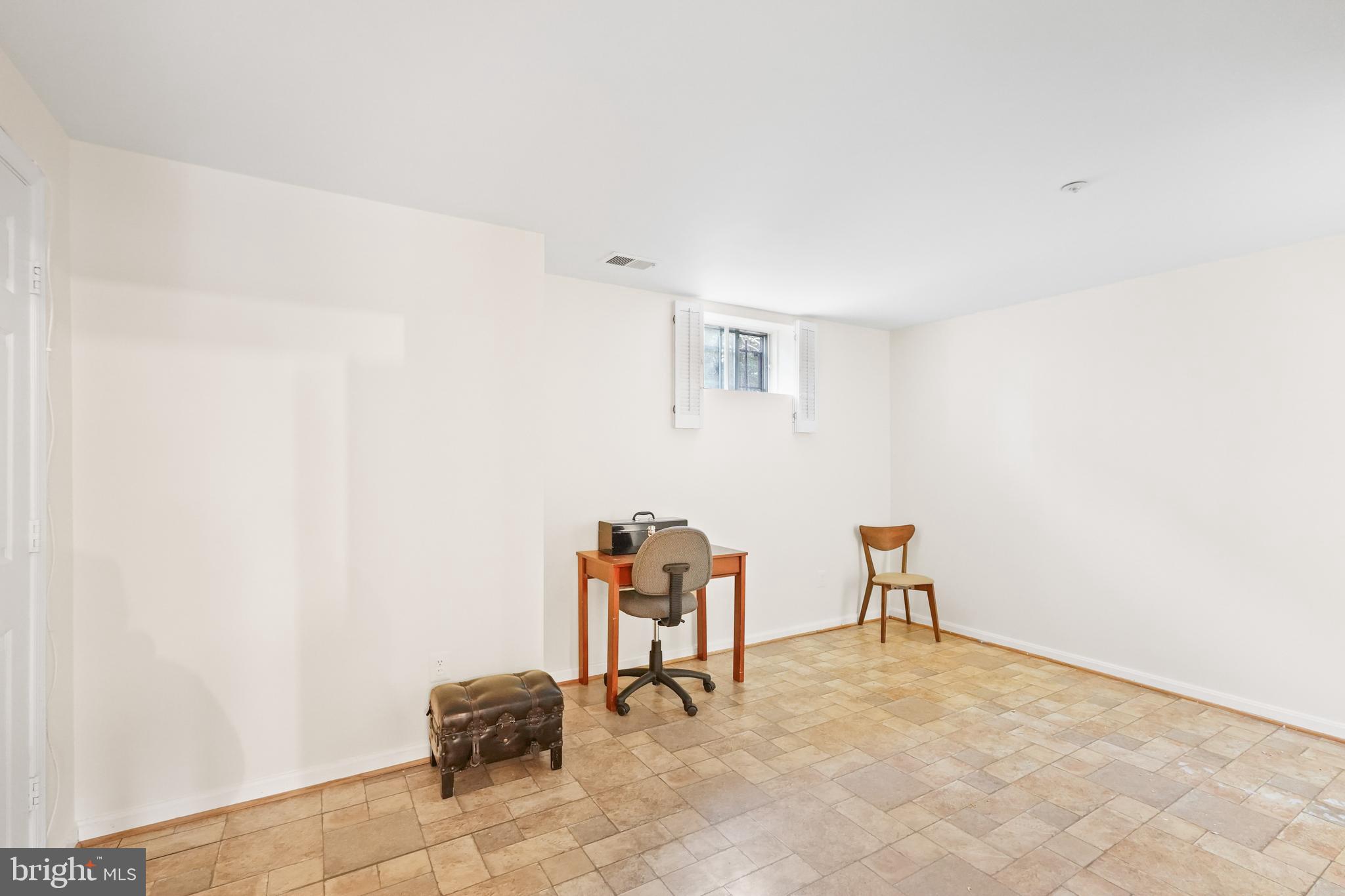 596 Chestertown Street Gaithersburg, MD 20878 - Photo 37 of 56 a view of a workspace with furniture and a window