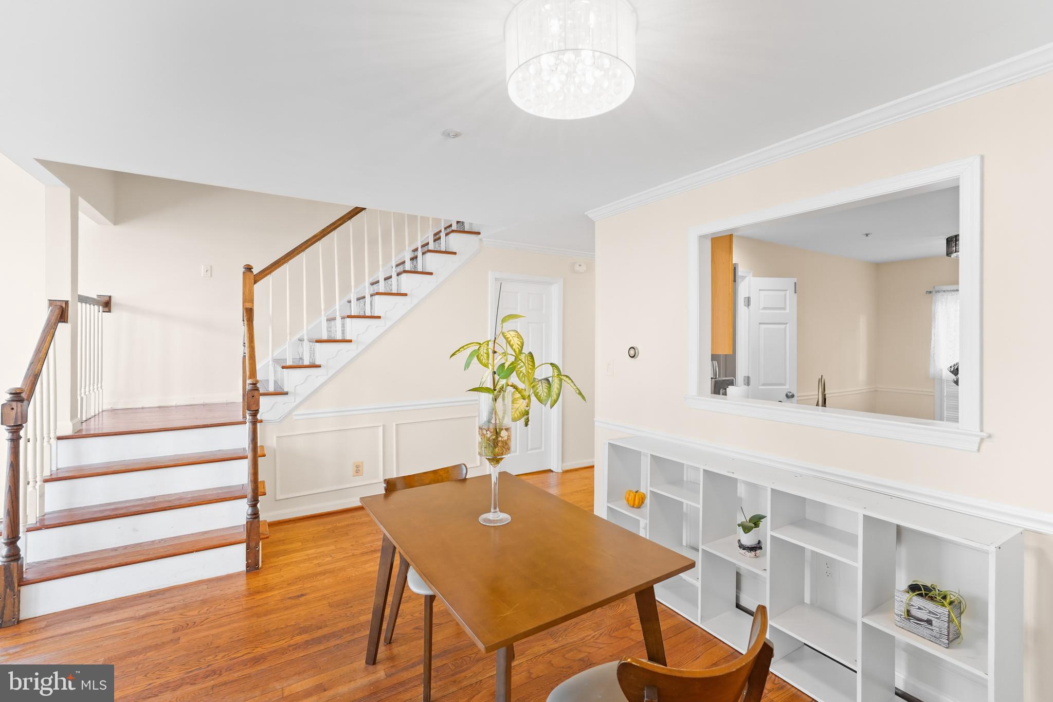 596 Chestertown Street Gaithersburg, MD 20878 - Photo 7 of 56 a view of a hallway with wooden floor and entryway