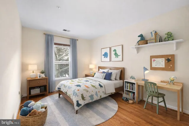 a view of a bathroom with a tub and mirror