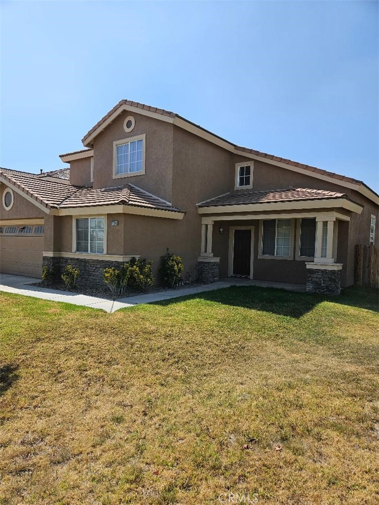 1136 Scenic Drive San Bernardino, CA 92408 - Photo 1 of 30 a front view of a house with a yard