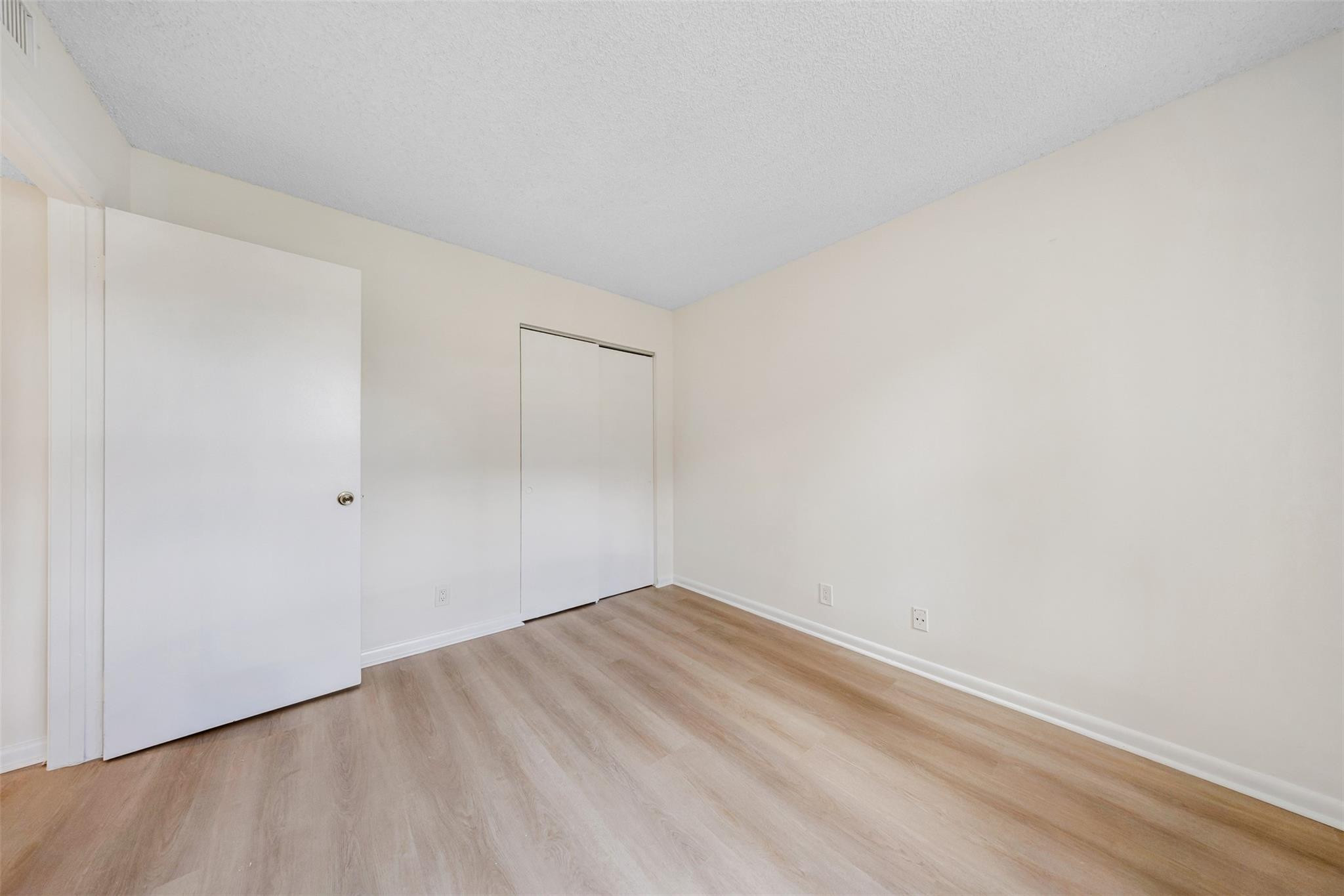 8977 Wiles Road, Unit 102 Coral Springs, FL 33067 - Photo 23 of 37 a view of empty room