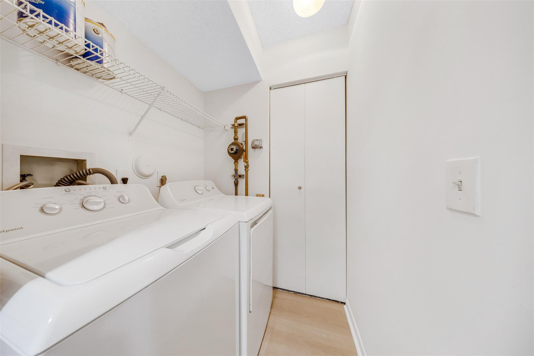 8977 Wiles Road, Unit 102 Coral Springs, FL 33067 - Photo 26 of 37 a utility room with dryer and washer