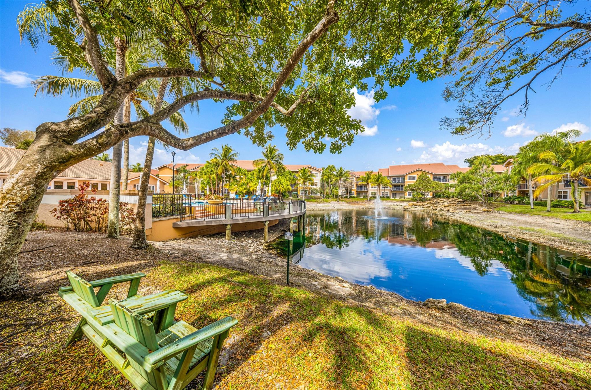 8977 Wiles Road, Unit 102 Coral Springs, FL 33067 - Photo 35 of 37 a view of a lake with houses