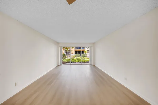 a view of an empty room and window