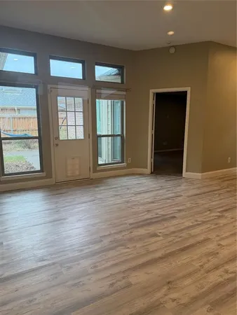 wooden floor and windows in a room