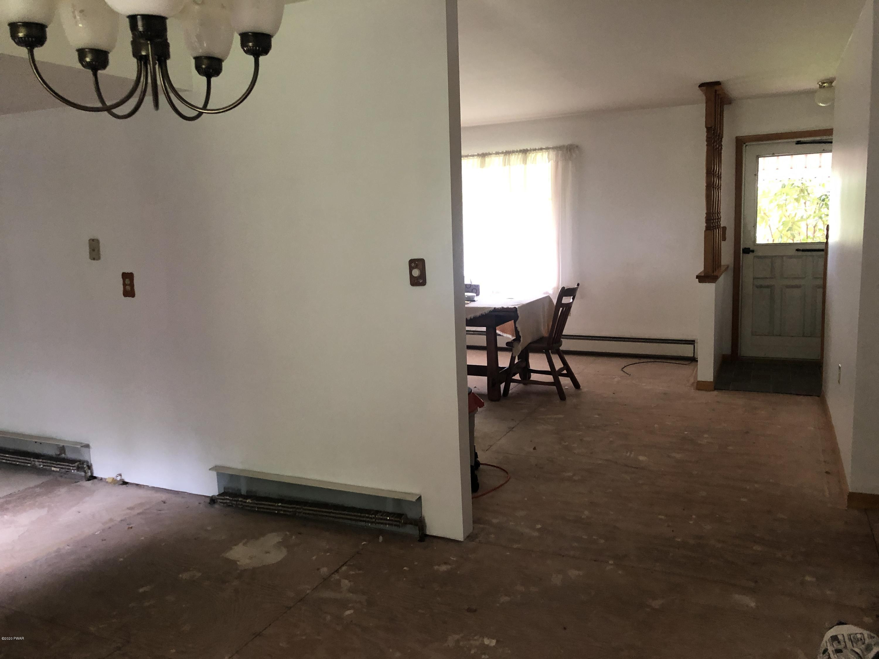521 Perkins Pond Road Beach Lake, PA 18405 - Photo 8 of 27 Dining Room to Living Room